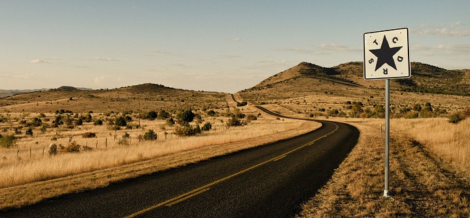 Road with TCDRS sign