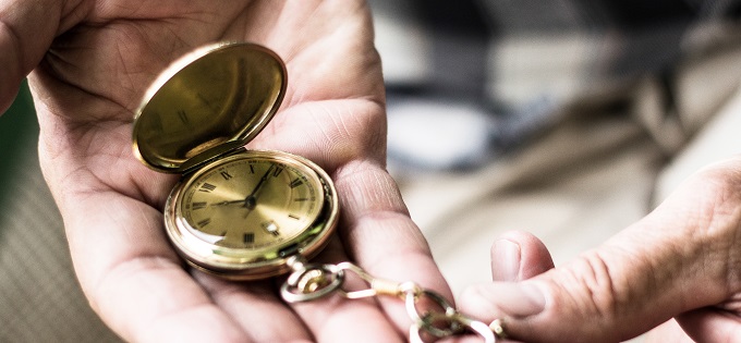 Antique watch in hands