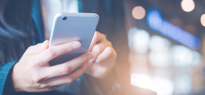 Woman searching mobile phone