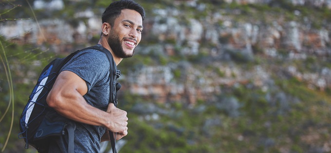 Article-Young-Man-Takes-a-Break-During-a-Hike-680x315