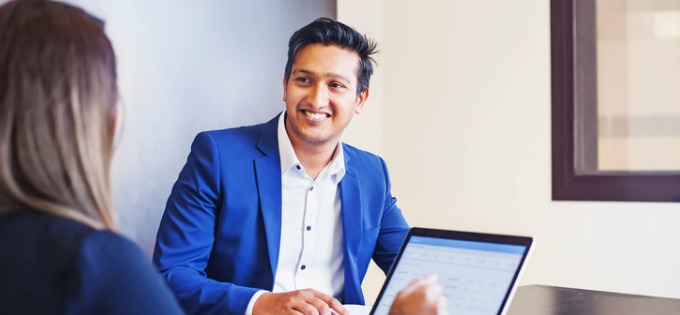 Article_Man-Smiling-at-Employer-680x315px