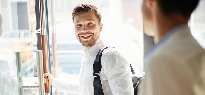 Smiling employee exiting