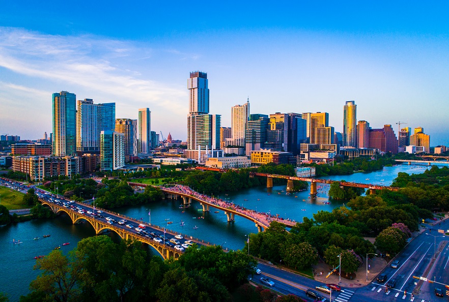 Employer Services-SidebySide-Austin Skyline-882x594