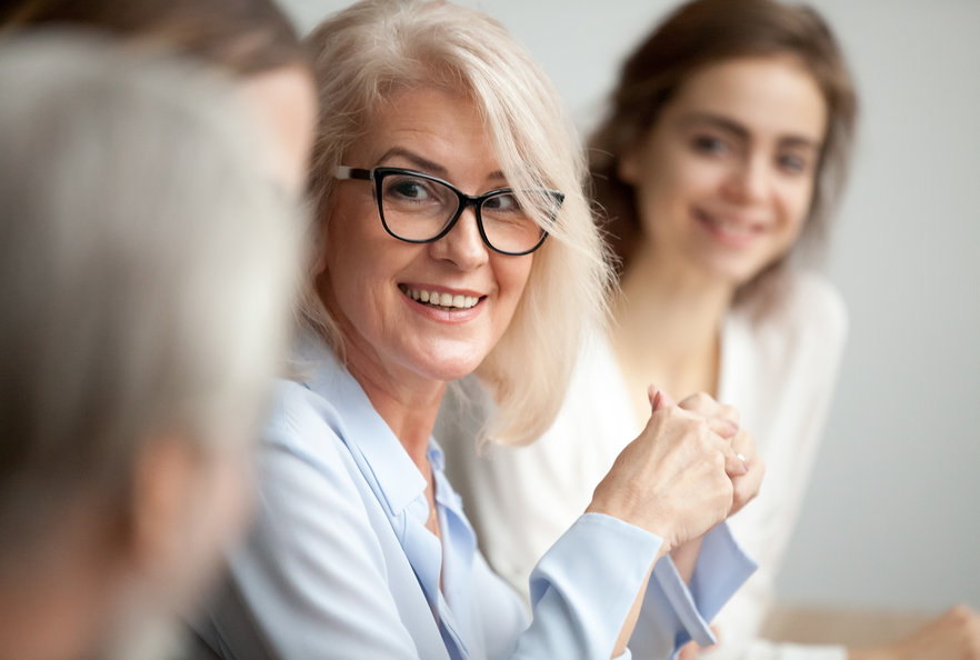 PlanAdministration-SideBySide-BusinessWoman1-882x594